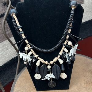 Black and Cream wood Beaded Necklace with Animal Charms